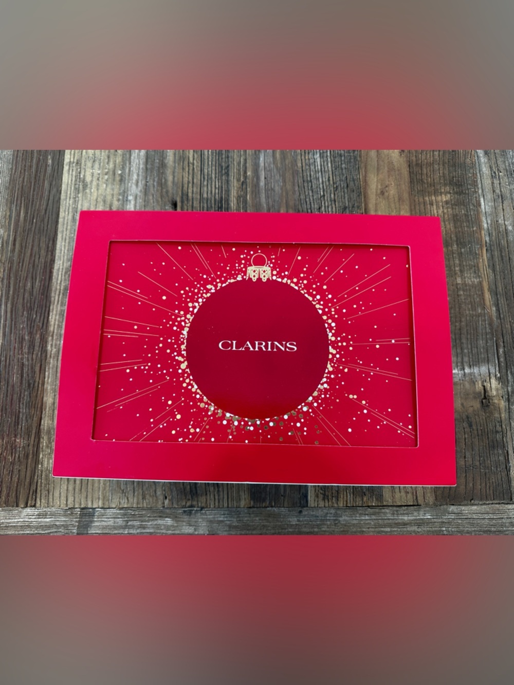 Clarins Festive Red advent calendar Box with Gold Accents